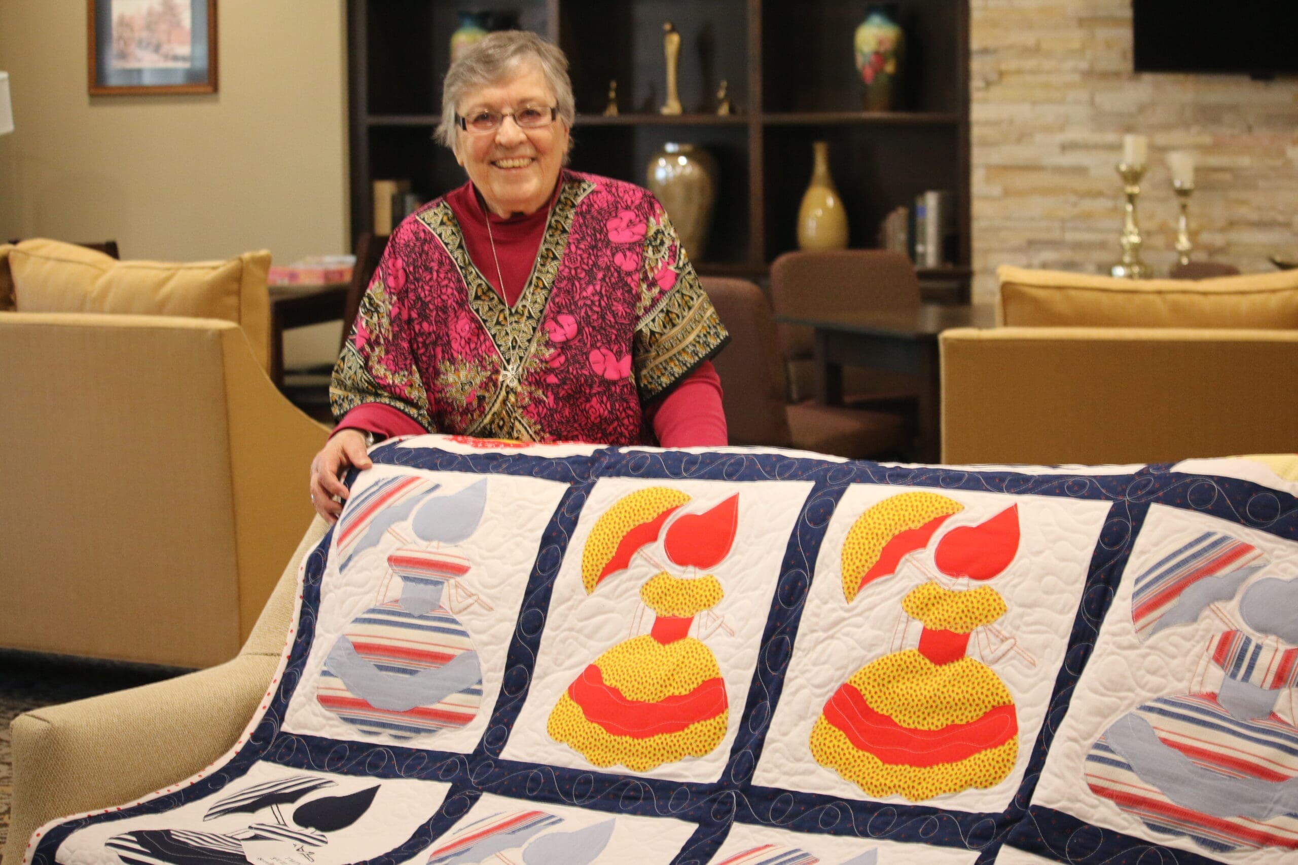 Sister Hilary w Quilt